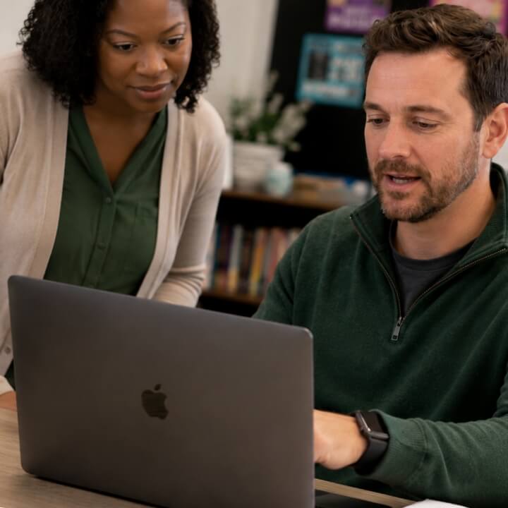 Teachers at laptop